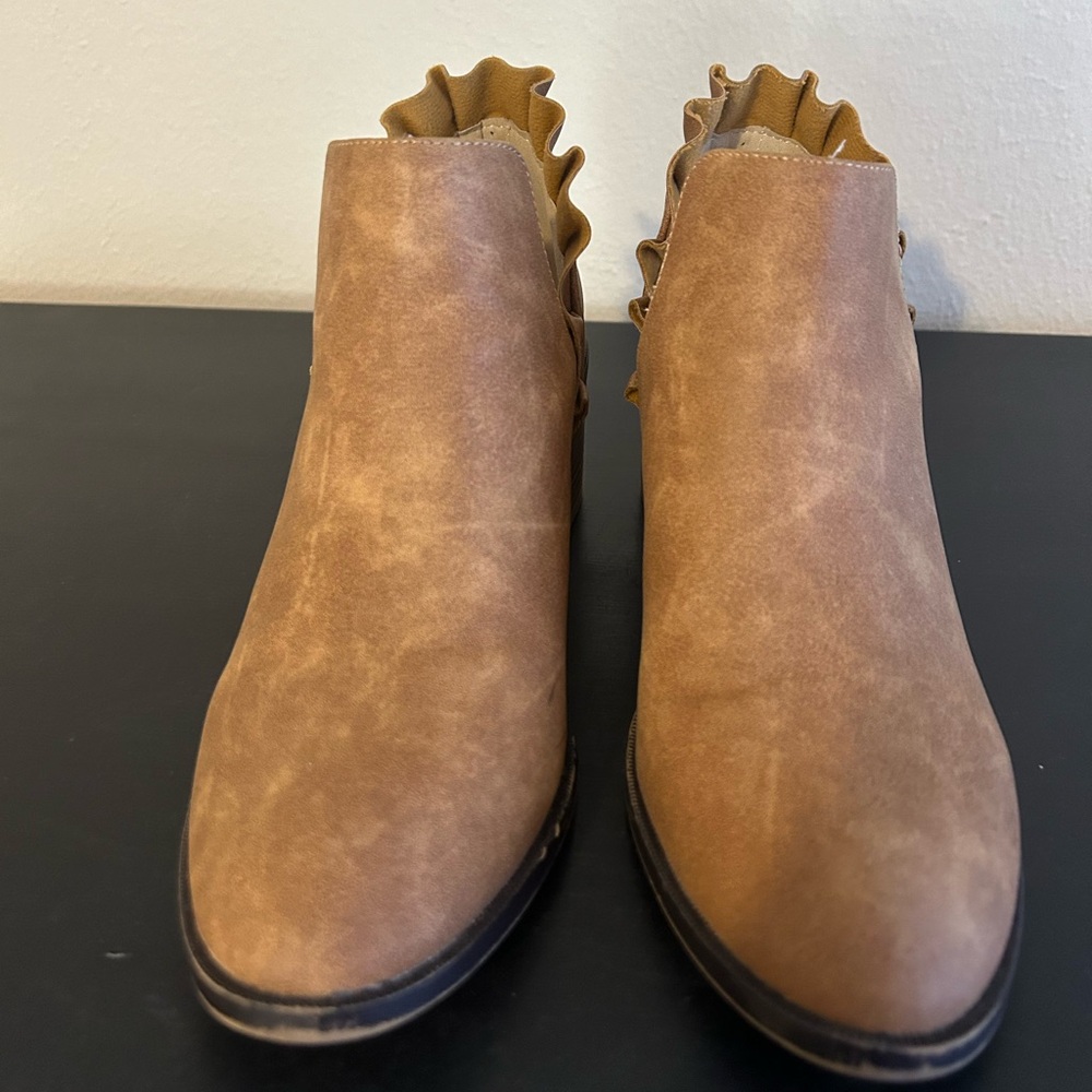 Tan ankle boots with scalloped ankle back